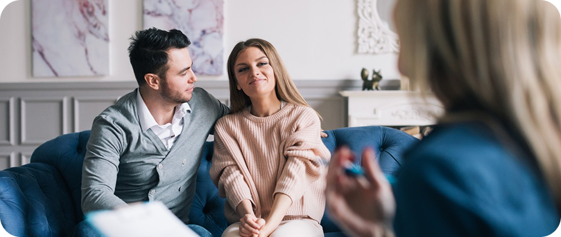Couple in a relaxed conversation during therapy